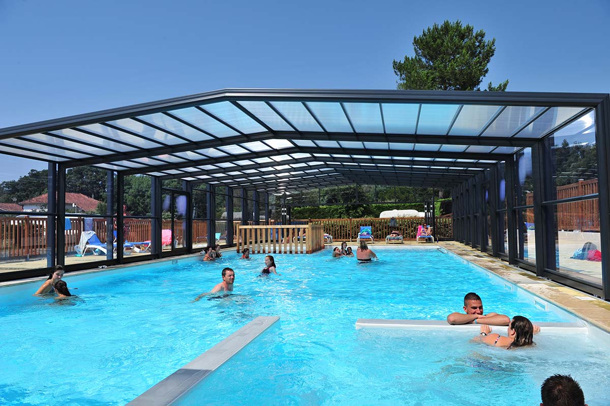 The covered and heated swimming pool of the campsite in the Landes near Hossegor