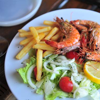 King prawns, fries and salad at the campsite restaurant near Vieux-Boucau