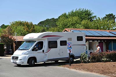 Motorhome coming out of a stopover in the Landes at Messanges at the Moussaillon campsite